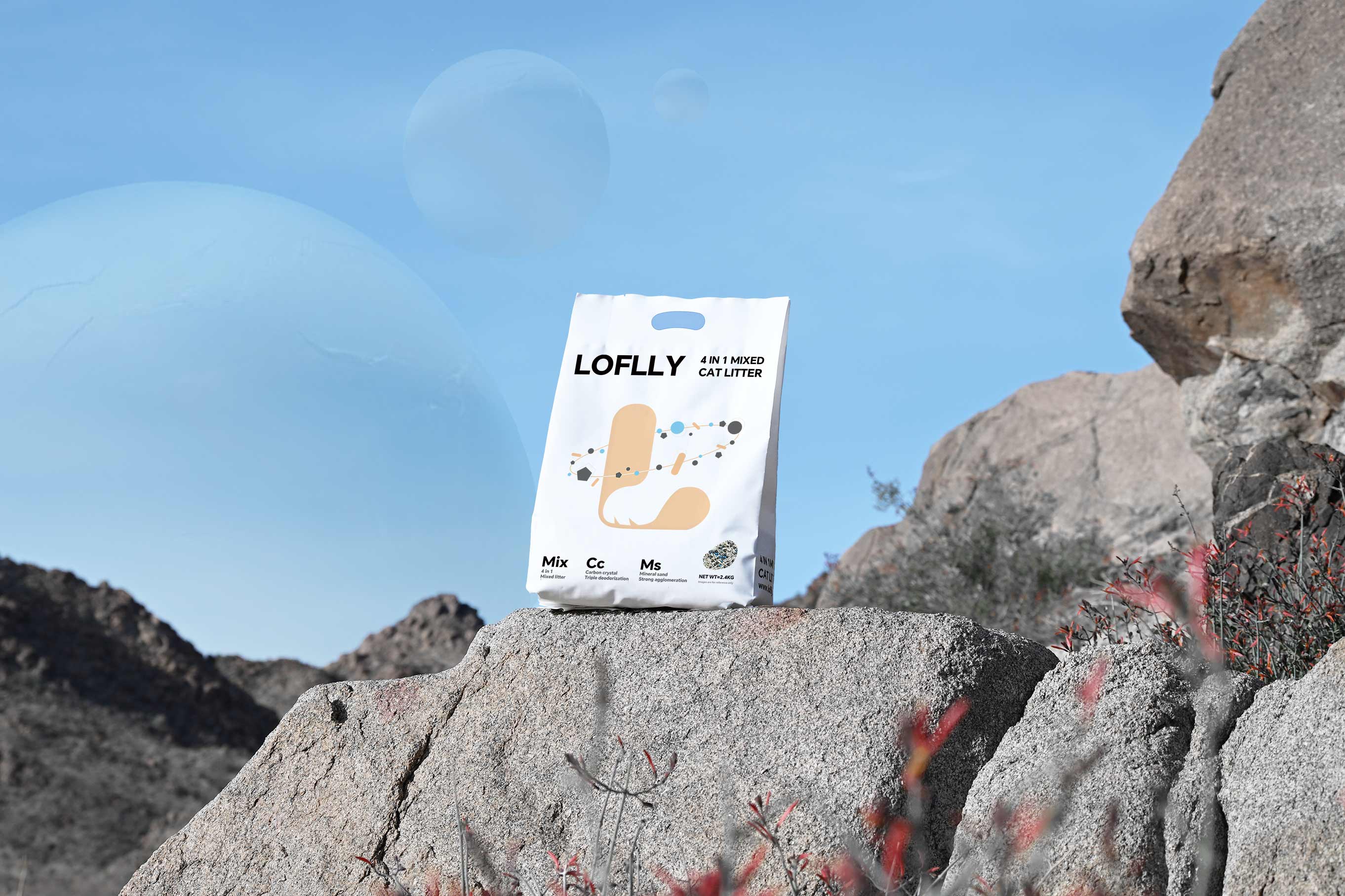 LOFLLY 4-in-1 mixed cat litter photographed at Joshua Tree National Park on a desert rock landscape desktop