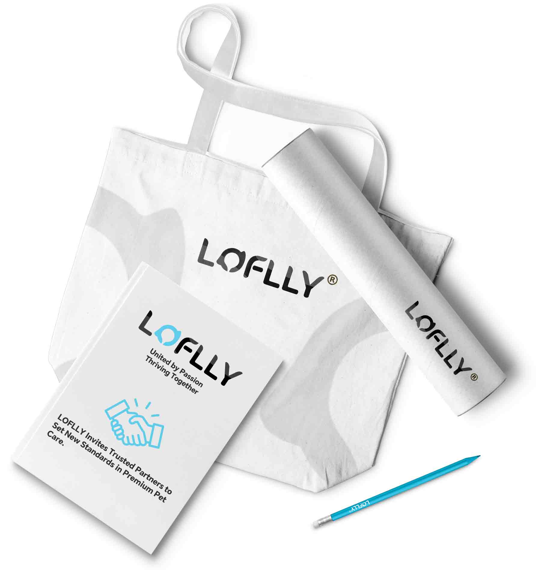 LOFLLY retailer welcome kit items: branded tote bag, presentation folder, pencil and rolled mat laid out on white background